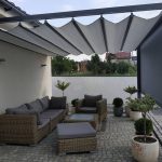 Pergola tarasowa dragon zapewnia dyskretne miejsce wypoczynku na tarasie