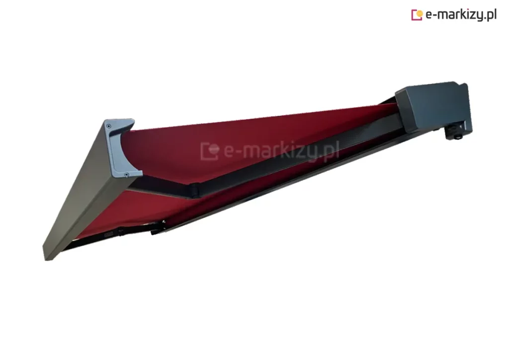 Umieszczona na białym tle markiza Quadra MOL z czarną konstrukcją i czerwonym poszyciem. Charakterystyczna kaseta po zamknięciu markizy tworzy nowoczesną, spójną osłonę o kubicznym kształcie.