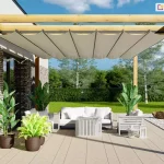 Pergola drewniana Juko wolnostojąca konstrukcja na 4 podporach z opcjonalnym dachem rzymskim ustawiona na tarasie wypełnionym roślinami oraz meblami tarasowymi.