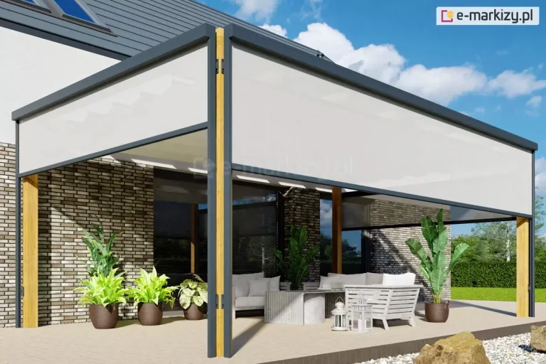 Pergola Juko wolnostojąca z roletą pionową refleksolem Ziiip z kwadratową kasetą mocowaną na uchwytach do podpór pergoli skutecznie chronią przed promieniowaniem słonecznym meble tarasowe oraz rośliny doniczkowe ustawione pod pergolą.