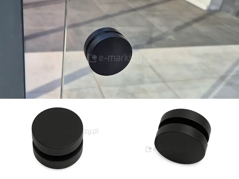 Obustronny uchwyt w kolorze czarnym przykręcony do bezramowego panelu szklanego Miros