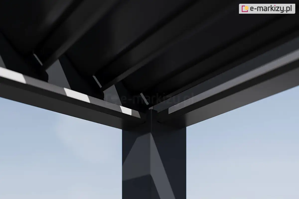 Zbliżenie konstrukcji dachu pergoli Rubio, przedstawiające precyzyjne połączenie profili aluminiowych i lameli. Detal pokazuje solidne wykonanie narożnika oraz system odprowadzania wody wbudowany w ramę. Wysoka jakość wykończenia gwarantuje trwałość, szczelność i elegancki wygląd całej pergoli bioklimatycznej.